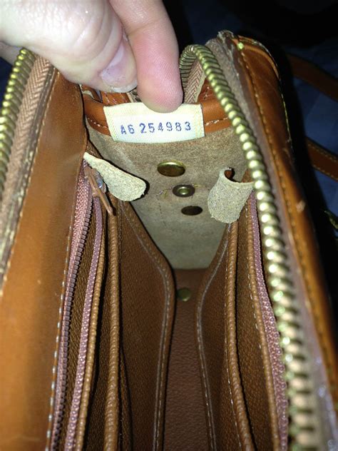 how to spot a fake dooney and bourke|dooney and bourke bag identification.